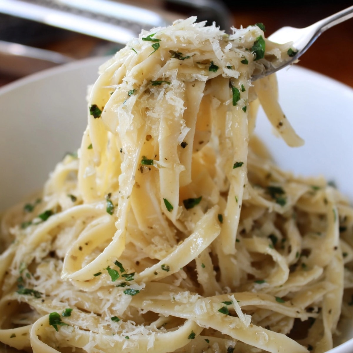 Golden Garlic Browned Butter Noodle Bowls, glistening with Parmesan and herbs, ready to eat.
