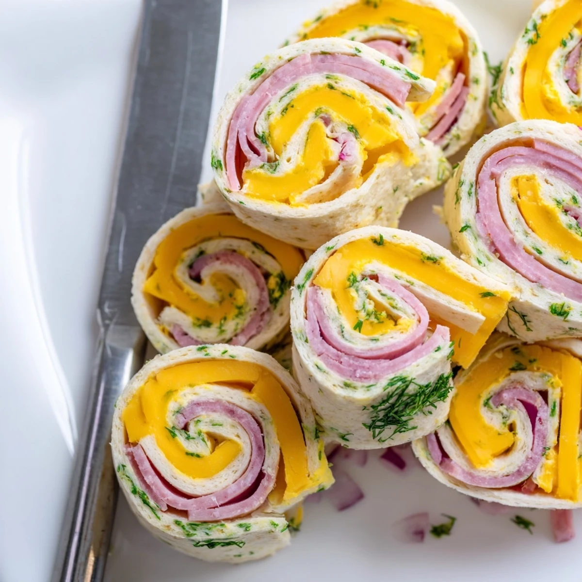 Crispy pickle-in-a-blanket snack rolled in soft tortillas with creamy cheese.  