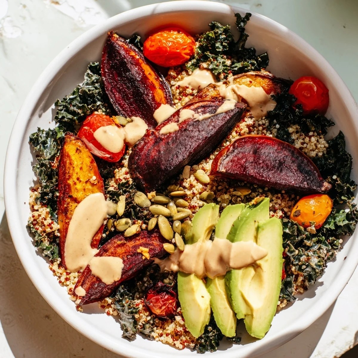 Fluffy quinoa, bright kale, and roasted beets compose this vibrant Quinoa, Kale & Roasted Beet Bowl.