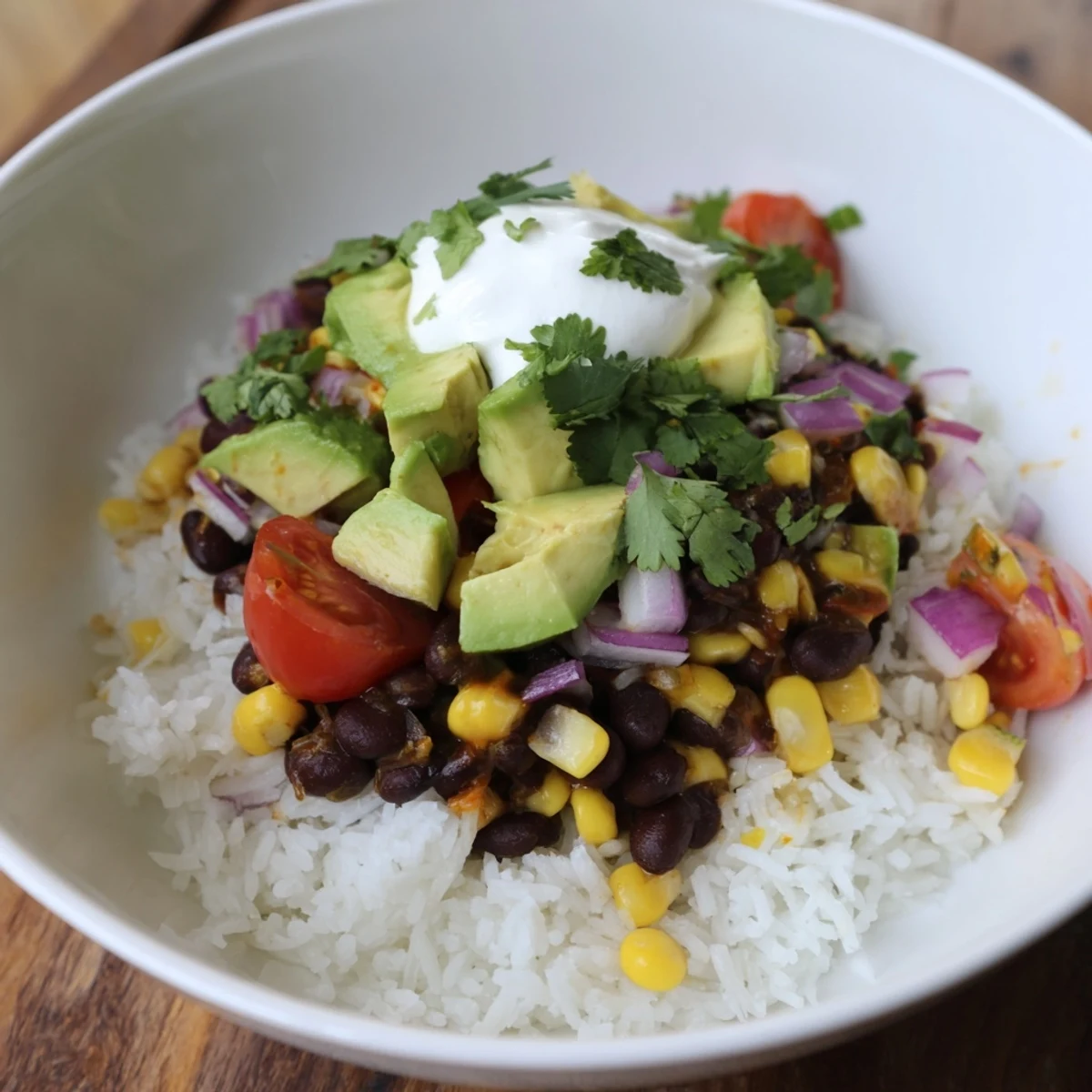 Fluffy rice, seasoned beans, and vibrant corn star in these colorful burrito bowls.