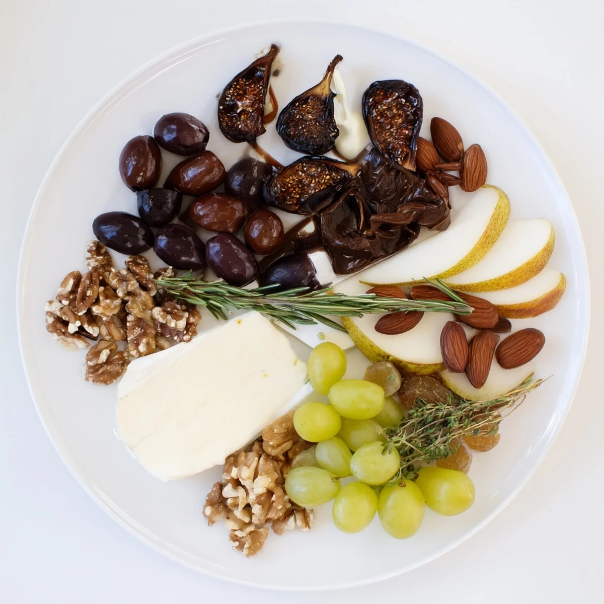 The stunning Winter Solstice Board features a contrasting arrangement of savory and sweet appetizers.