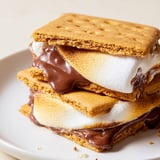 Easy Air Fryer Smores, a classic campfire treat, features perfectly toasted marshmallows, ready to enjoy.