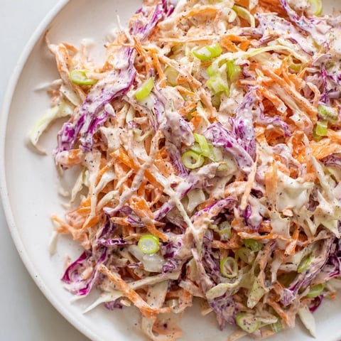 Vibrant Quick Coleslaw Salad filled with shredded cabbage and carrots, coated in creamy dressing.