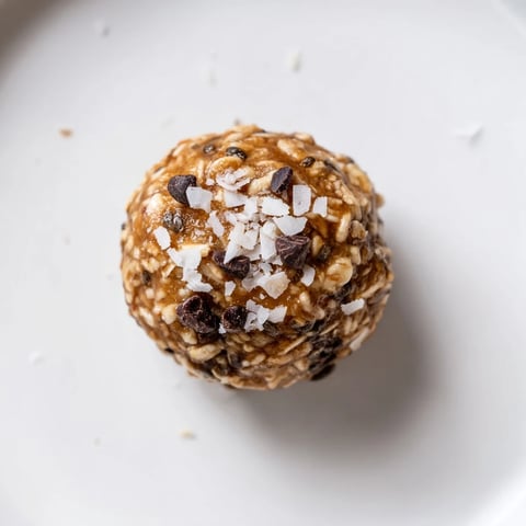 Chewy Almond-Chia Energy Bites ready to eat, showing the perfect texture for a quick snack.