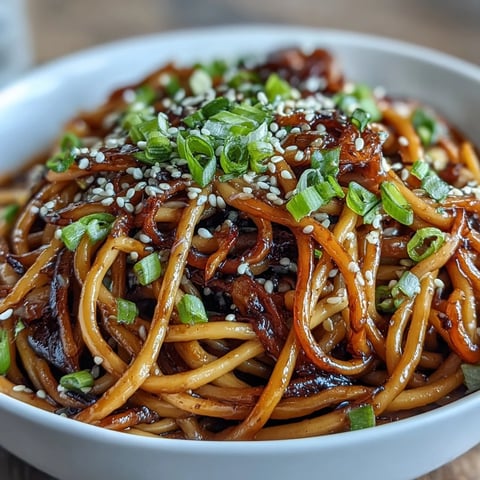 Asian Ginger Scallion Noodles with Soy Glaze - Tender noodles tossed with fragrant ginger, scallions, and a savory-sweet soy glaze for a quick, umami-rich meal.