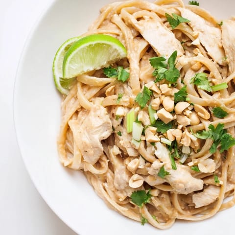 A close-up of creamy, flavorful Thai Peanut Chicken Pasta, ready for a satisfying dinner.
