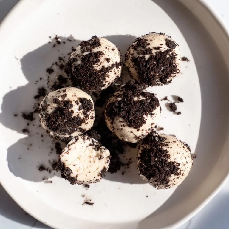 Perfect homemade Cream Cheese Oreo Protein Balls, ready to be enjoyed as a post-workout snack or treat.