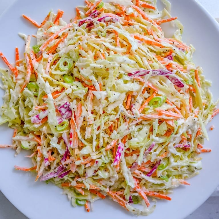 Homemade Quick Coleslaw Salad, boasting colorful shredded veggies, ready to enjoy alongside barbecue.