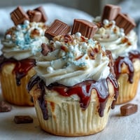 Simple Graduation Cupcakes with Cap Toppers: festive vanilla cupcakes topped with buttercream and edible graduation caps.